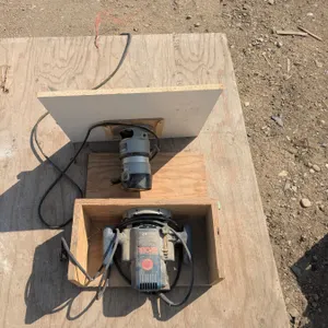 2 homemade router tables/jigs, with routers
