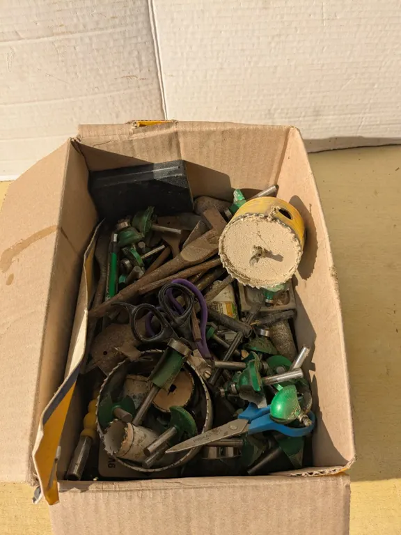 Box of router bits, holesaws, etc