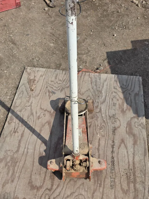 Power fist floor jack