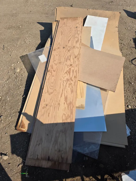 Pallet of misc mdf boards, plywood and cracked plexi glass