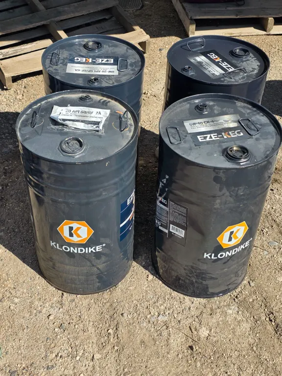 4- 52L steel oil drums- empty