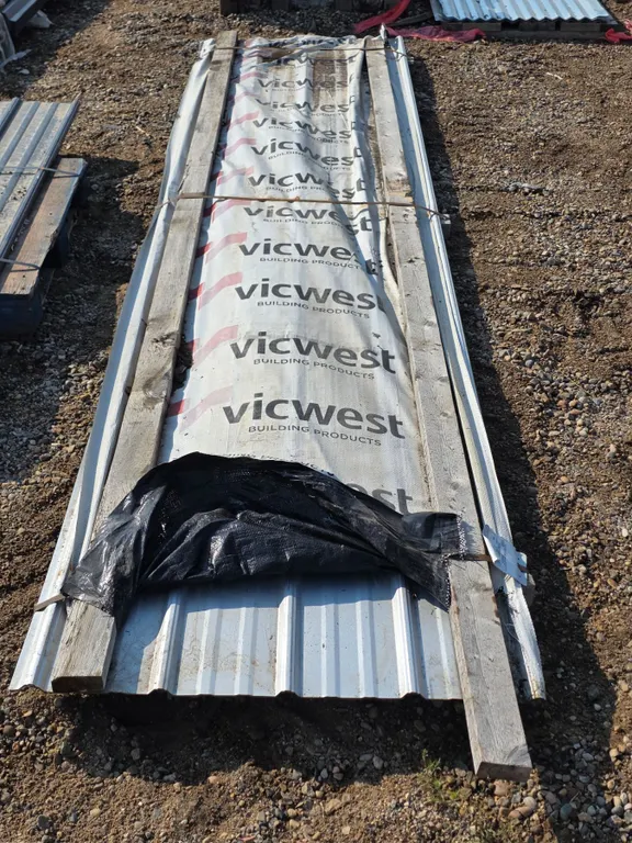 Assorted siding/ facia- 14ft by 42"W- approx 10 pieces