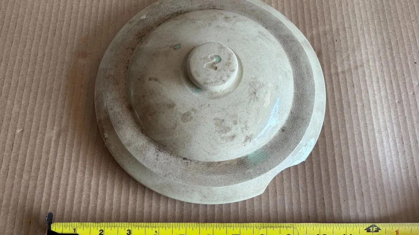 9.5” Crock lid (has large chip missing)