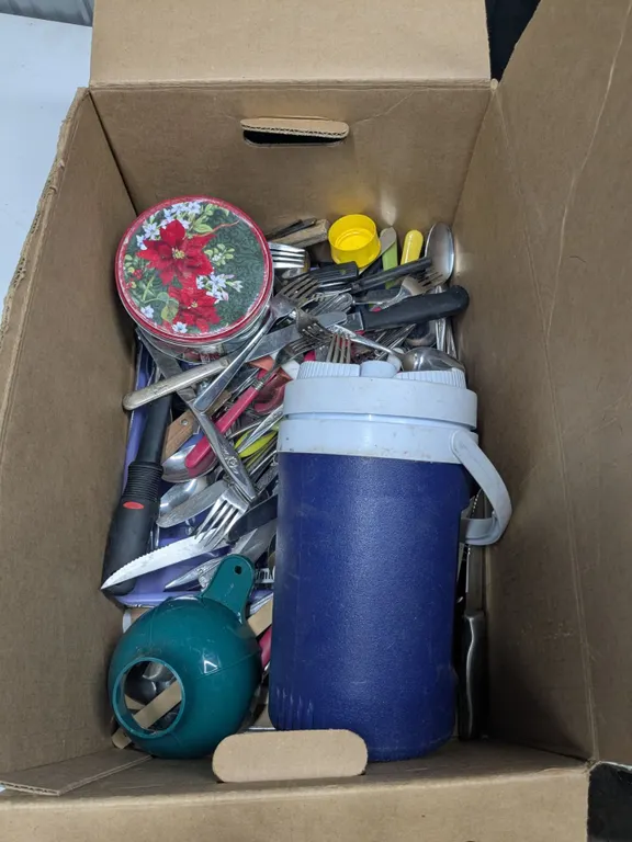 Box of cutlery and kitchen ware