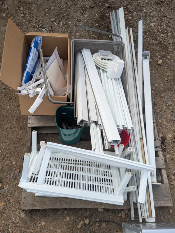 Mixed pallet lot- Brackets, shelving parts, etc