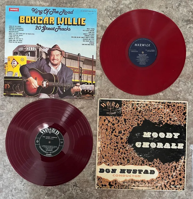 Lot of 2 LP records. Both are rare red vinyl. Boxcar Willie & Don Hustad