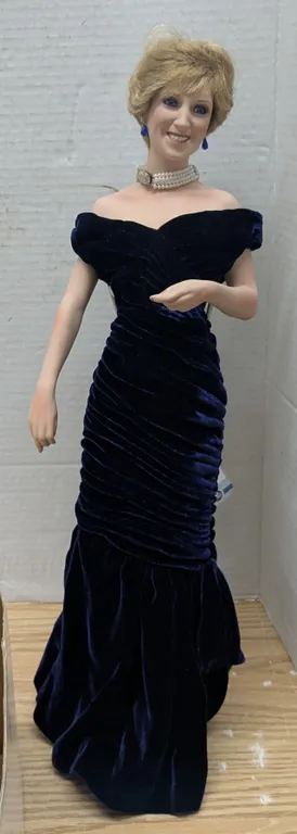 Porcelain Princess Diana doll, approximately 20", comes with stand and original box
