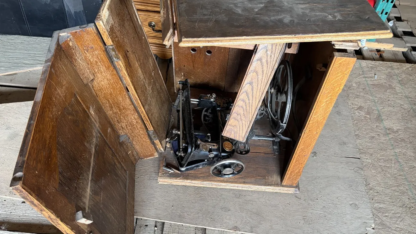 Sewing Machine with broken table.