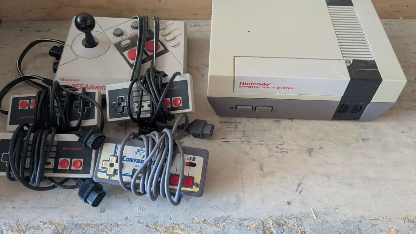Vintage Nintendo (NES) w/ Advantage Joystick and (4) Controllers – Not Tested