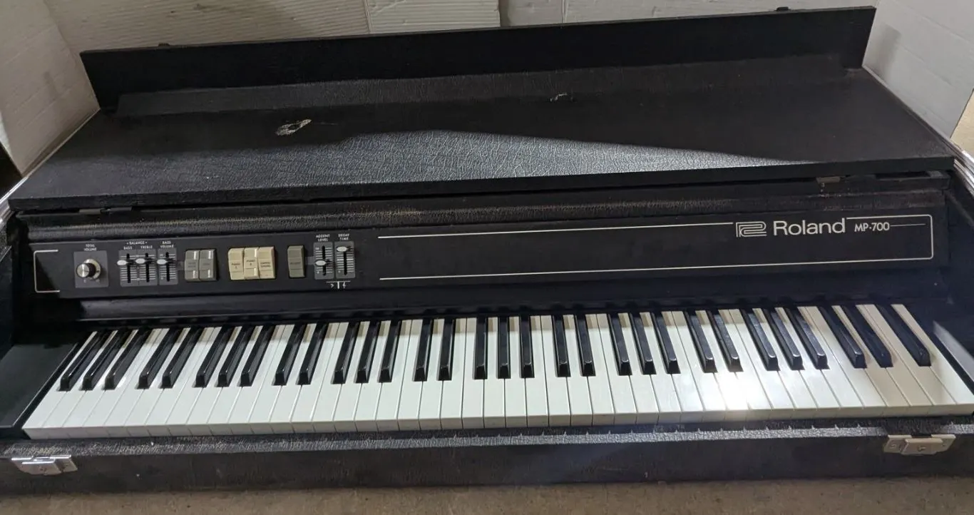 Vintage "Roland" Electronic piano, 49x24x10"