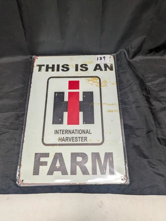 Metal sign, 12x8", IH sign