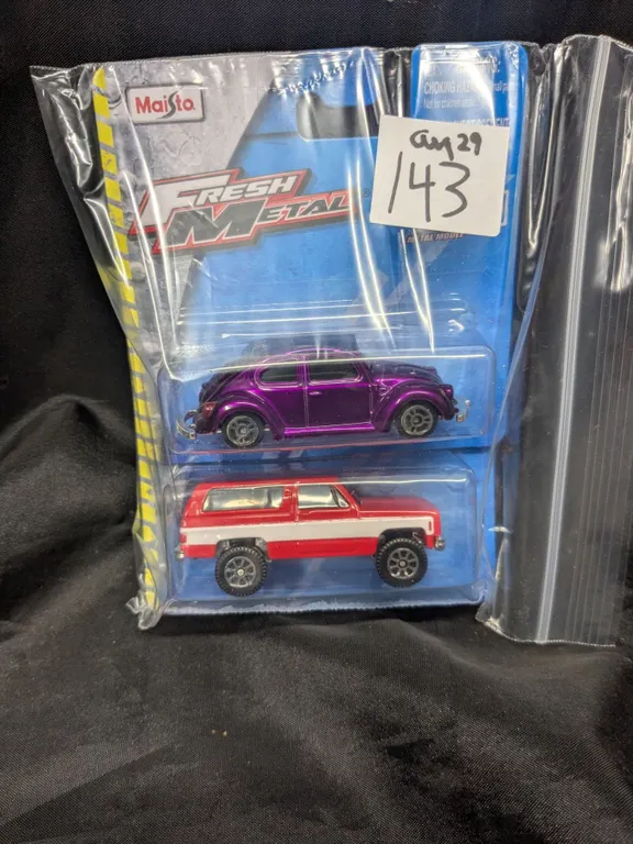 Toy blazer and VW bug