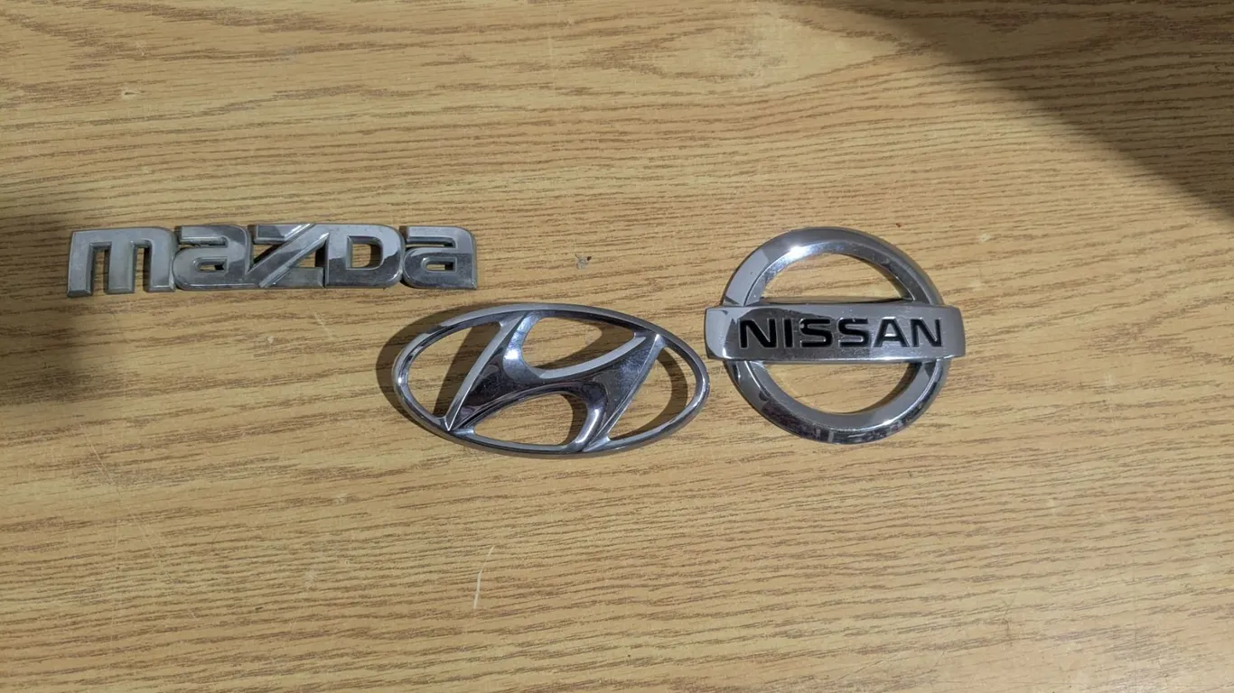 Nissan, Mazda, and Hyundai Emblems