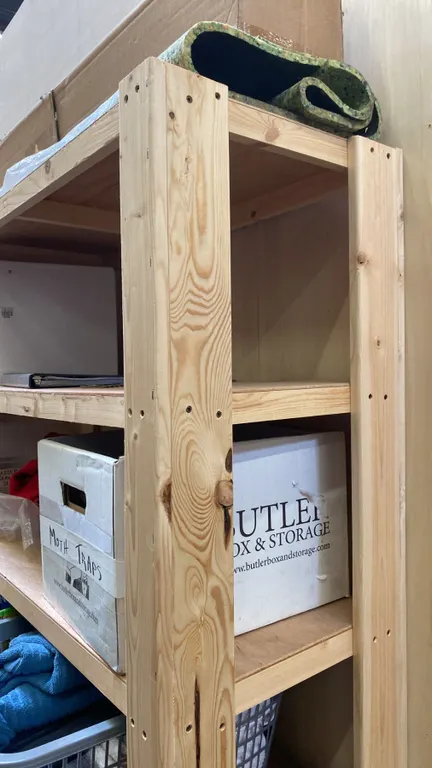 2 LARGE WOODEN SHELVING UNITS - EACH MEASURES APPROX. 8FT X 1 1/2FT X 6 1/2FT HIGH