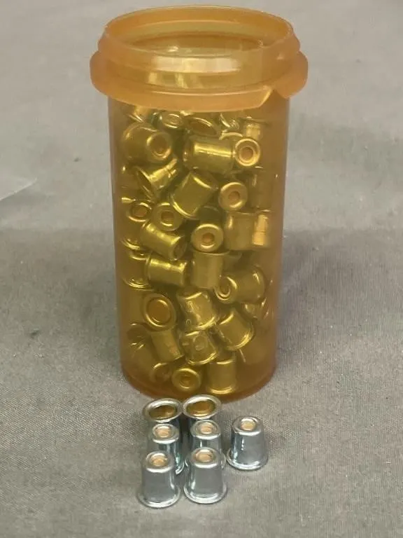Pill bottle full of identified shell primers.