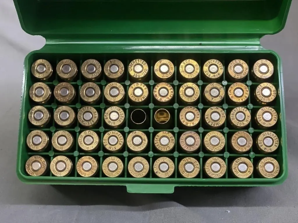 Fifty Winchester.308 cal. WIN brass in a