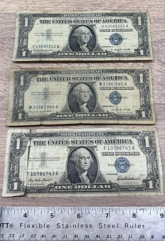3 American One Dollar Bills. Damaged/Ripped.