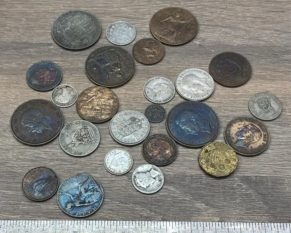 24 Asst. British Coins.