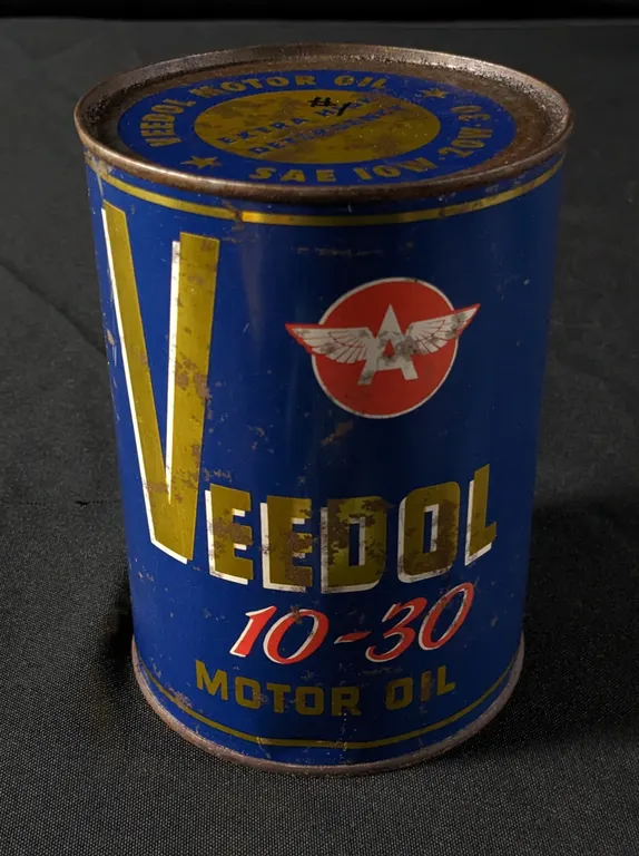 FULL QUART OIL CAN VEEDOL 10-30 MOTOR OIL