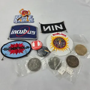 Assortment of patches, pins, and tokens