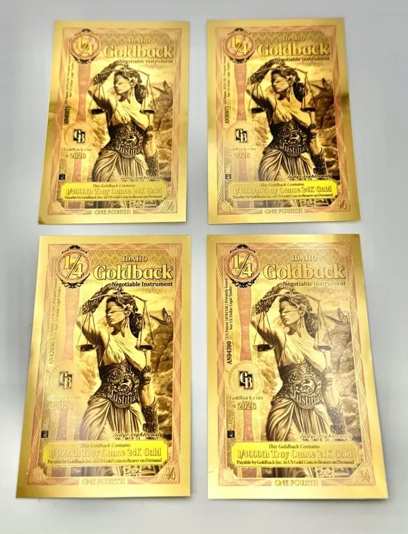 Four Idaho 1/4 Goldback Notes