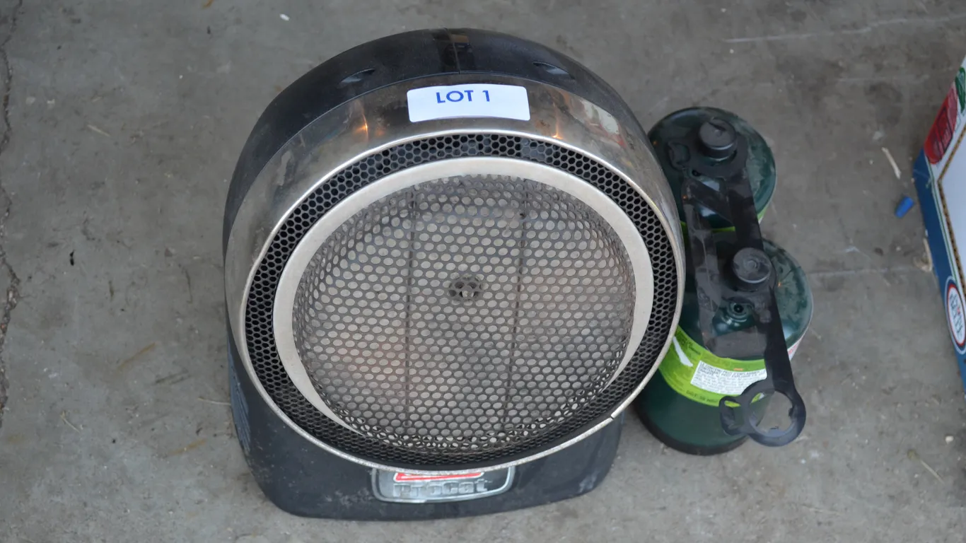 Coleman Heater with extra propane cylinders