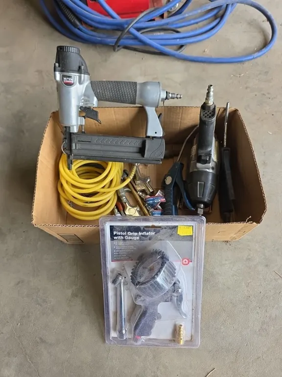 Box of air compressor tools and accessories