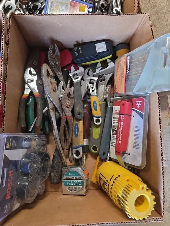 Box of cresent wrenches, pliers, drill bits