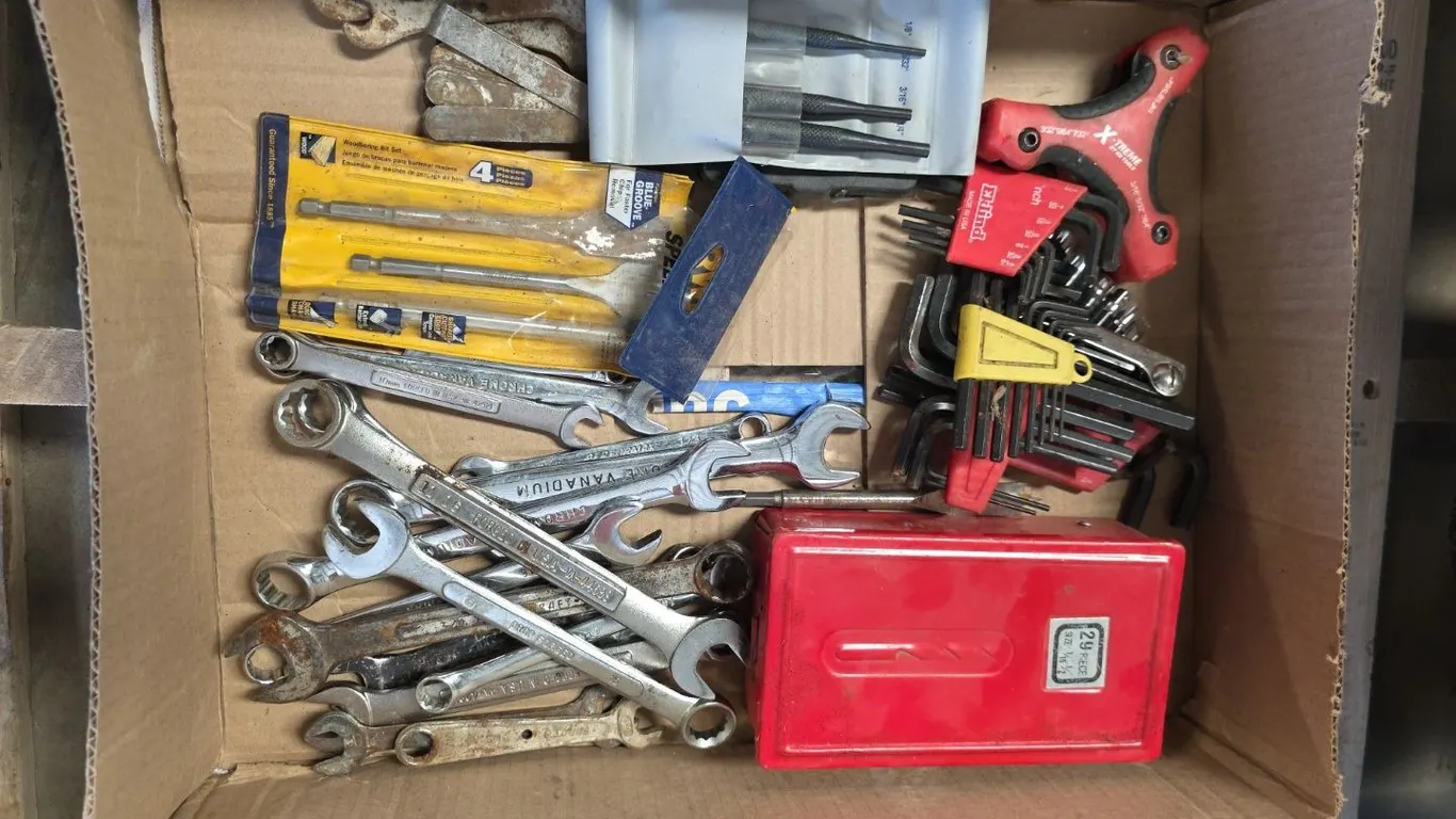 Box of wrenches, allen wrenches, punches, drill bits and spade bits