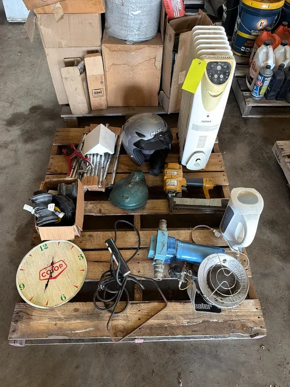 Pallet of Heaters, Tooks, Helmets, Water Well Cap, Wind Chimes, Coop Clock, water Tank Couplings, Etc