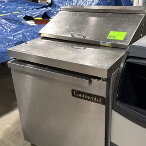 Continental SW27-B self-contained 1-door refrigerated sandwich prep table. Features stainless steel construction, top pan compartment with hinged cove