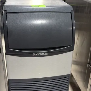 Scotsman CU0920MA-1A self-contained undercounter ice maker with built-in storage bin. Features front-access slide-up bin door. S/N: 21111320010465. Re