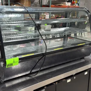 Avantco 360BCC48HCB self-contained refrigerated countertop display case. Features curved front glass, rear sliding glass doors, and 2 adjustable wire 