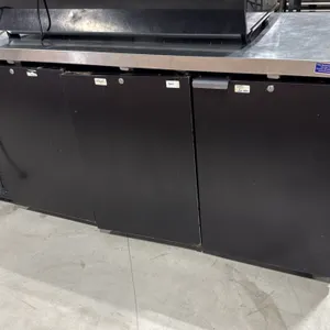 Continental BBC79 self-contained 3-door back bar refrigerator. Features a stainless steel flat top and black exterior finish. 79"W. S/N: 15131359. Ele