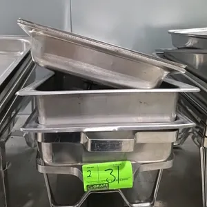 Stainless steel chafing pan sets. Includes lids, pans, and wire stands.