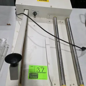 Vevor SKA450 Shrink-A-Pack I-bar shrink wrap sealer. Features a 450mm sealing arm, dual film roller cradle, and adjustable timer dial. Dimensions: 65 