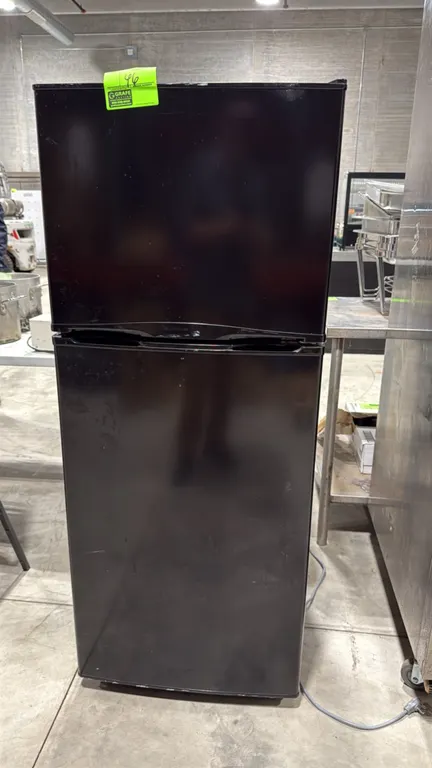 Criterion CTMR99M1B top-freezer refrigerator. Features 9.9 cu. ft. capacity, black finish, wire freezer shelf, glass refrigerator shelves, and dual cr