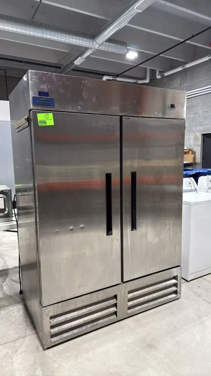 Arctic Air AF49EX self-contained 2-door reach-in freezer. Features stainless steel exterior construction, two solid doors with recessed handles, Dixel