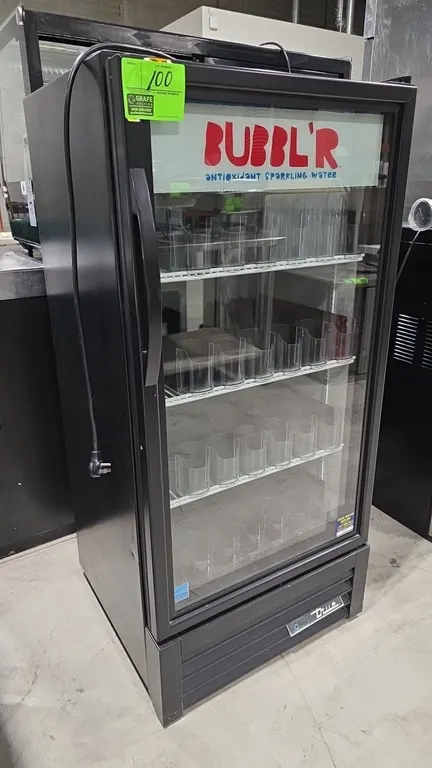 True GDM-10-HC-TSL01 single-door glass door display merchandiser. Features illuminated Bubbl'r sign panel, adjustable wire shelves with beverage organ