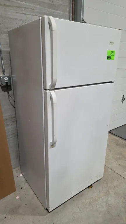 1994 Frigidaire FRT18JRBW0 top-freezer refrigerator. Features self-contained refrigeration, white finish, adjustable wire shelving, crisper bins, and