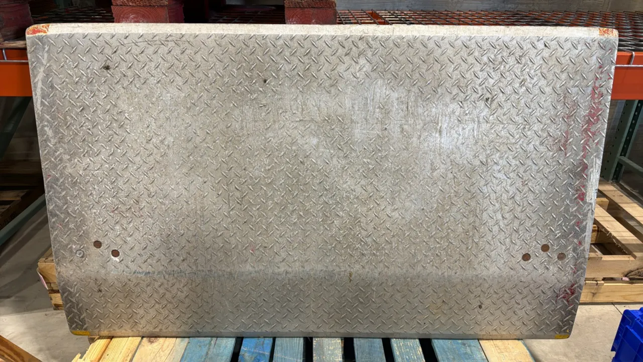 Aluminum dock plate. Features diamond tread surface, beveled edges, and bolted steel stop legs. 60" x 36".