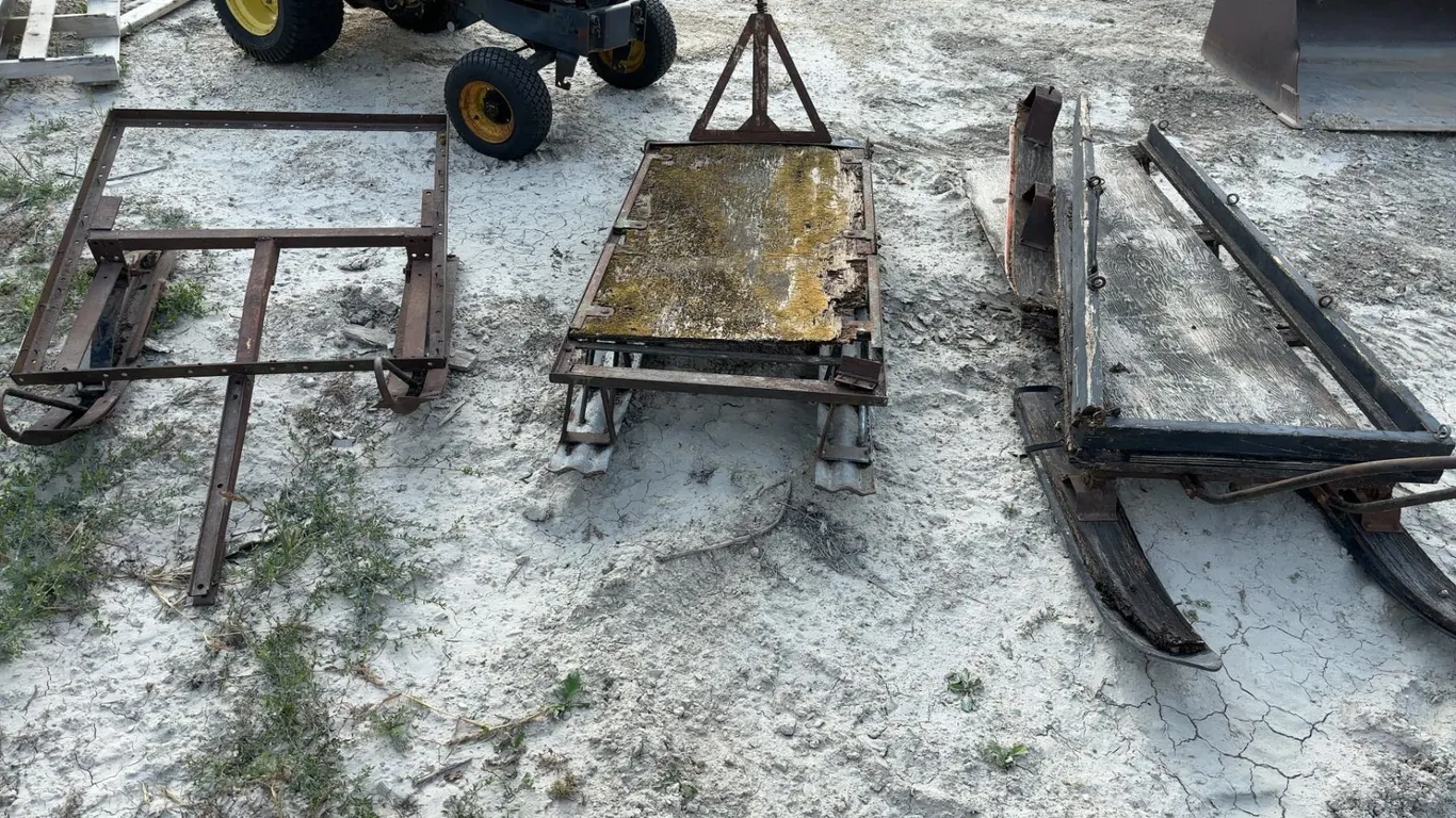3 Vintage Snowmobile Sleighs
