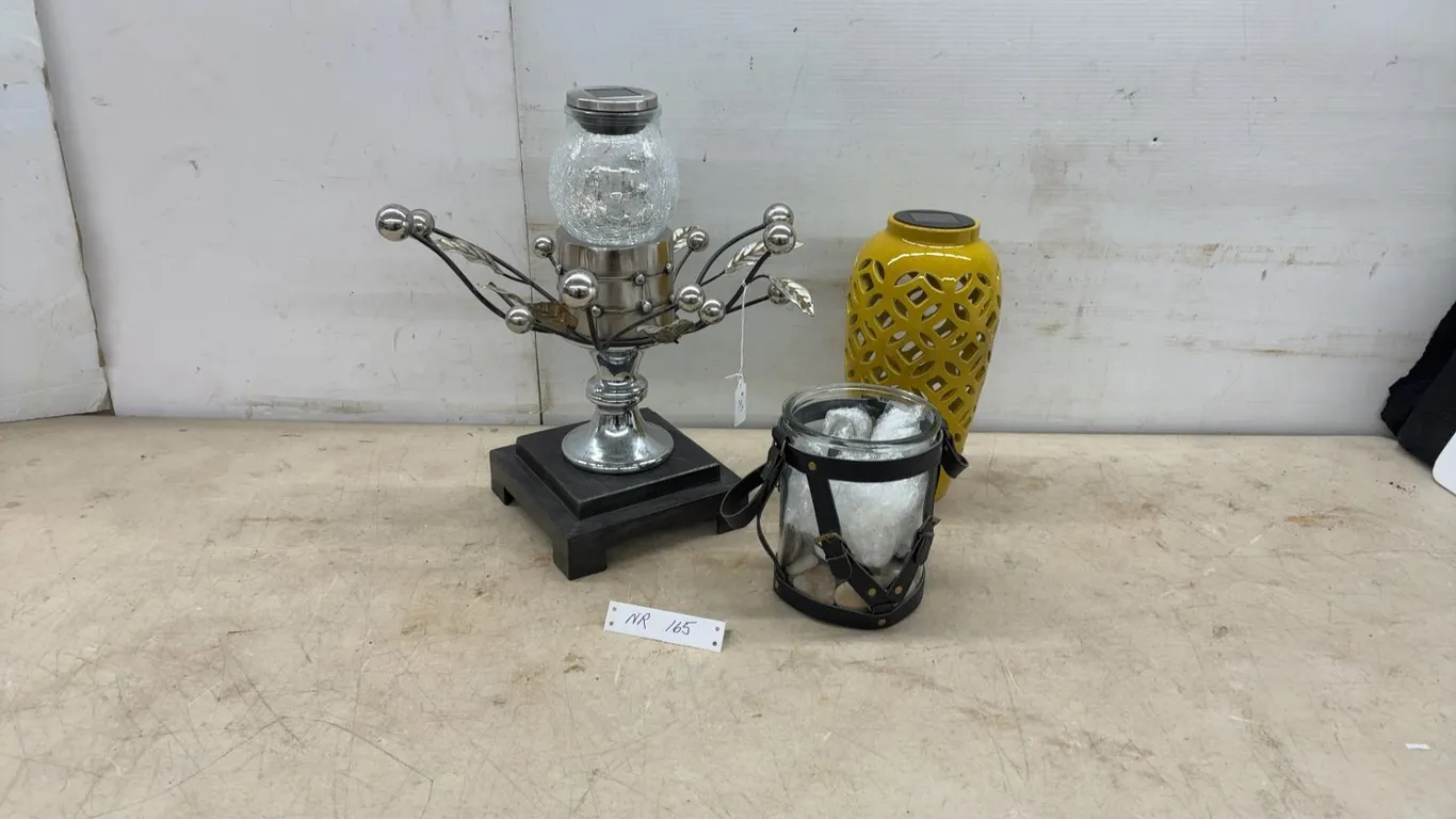 Three Decorative Solar Lanterns Including Metal and Wood Tabletop, Yellow Ceramic, and Glass Jar