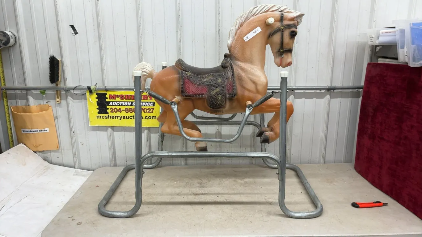 Vintage Spring-Mounted Rocking Horse with Metal Frame and Handles