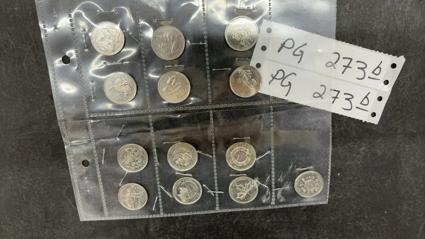 Thirteen Canadian 1999 and 2000 Millennium Series Commemorative Quarters