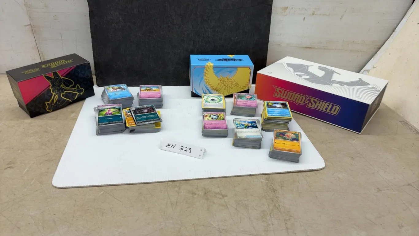 Pokémon Trading Card Game Crown Zenith, Paradox Rift, and Sword and Shield Boxes with Cards