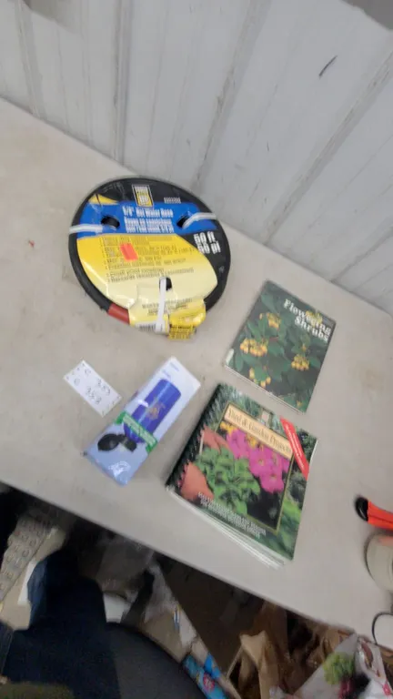 5/8” × 50' Rubber Water Hose, 2 Garden Books, and Water Pump Filter