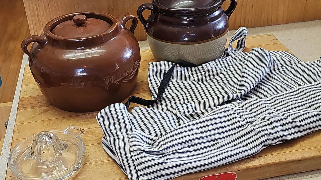 2 Bertoy Stoneware Crocks, Glass Juicer, Apron, and Cutting Board