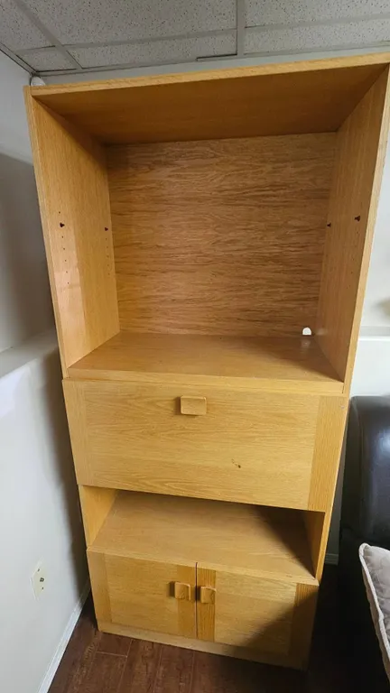 Light Wood Cabinet with Shelves and Storage Doors