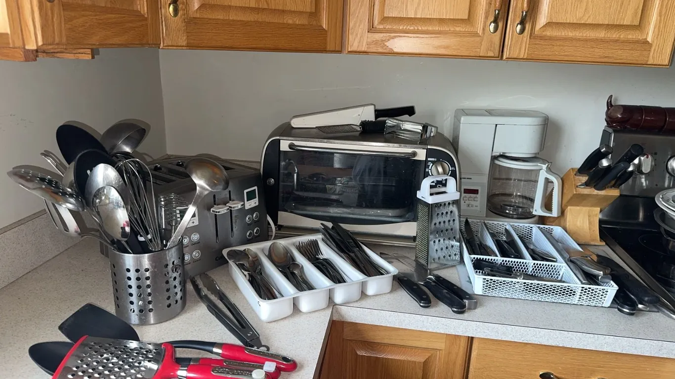 Kitchen Appliance and Utensil Lot: Toaster, Toaster Oven, Coffee Maker, Flatware, Knives